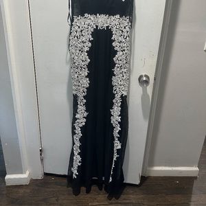 Dress women’s. Black, white embroidered accent. Size 2